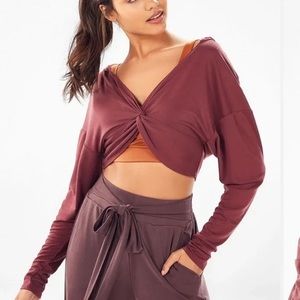 Burgundy long sleeve workout top with hood. Super cropped, size xs